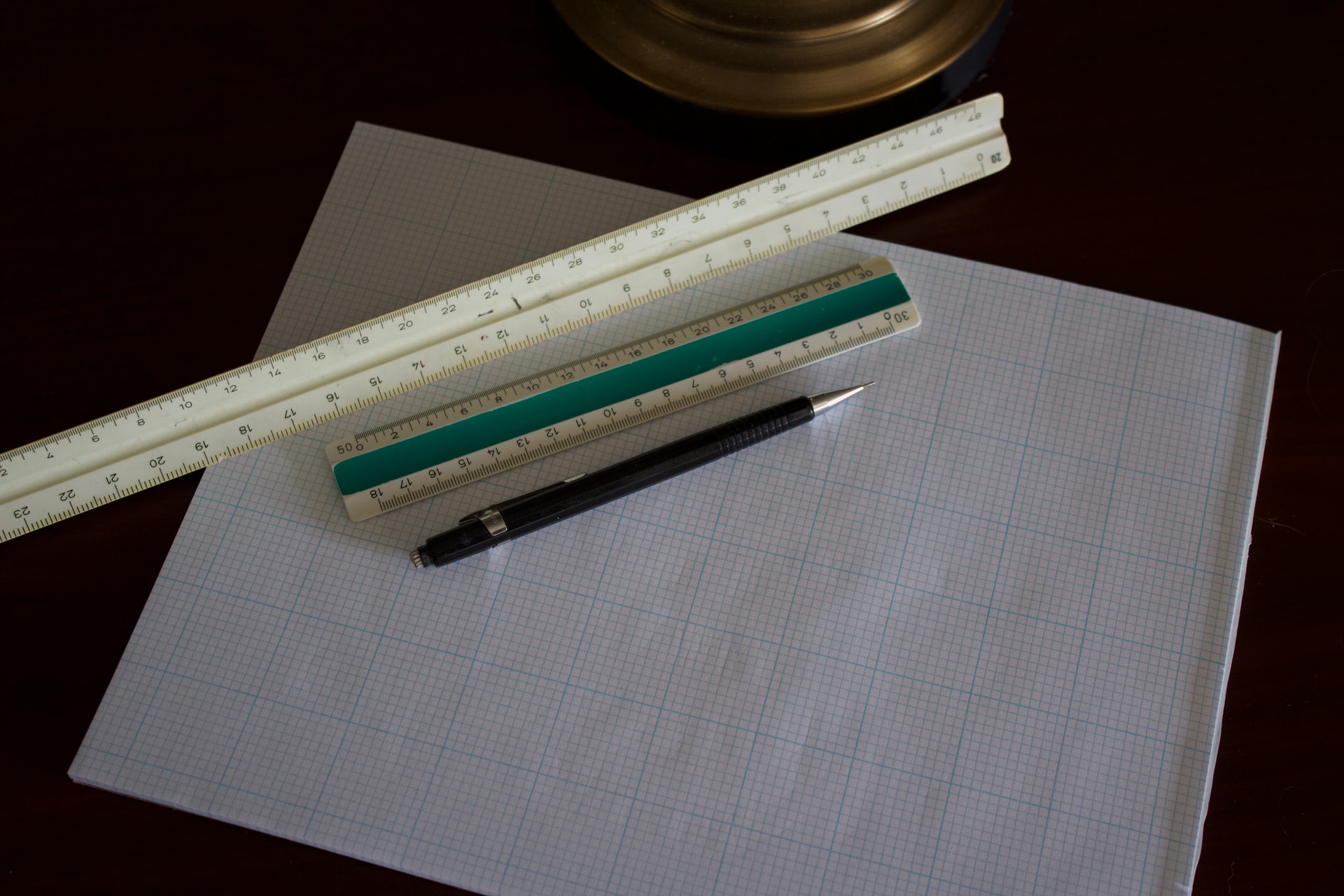 Graph paper, rulers, and a pen